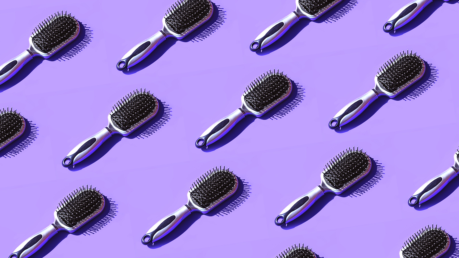 Trendy Beauty Product Pattern made of Hair Brush on pastel lavender violet background.