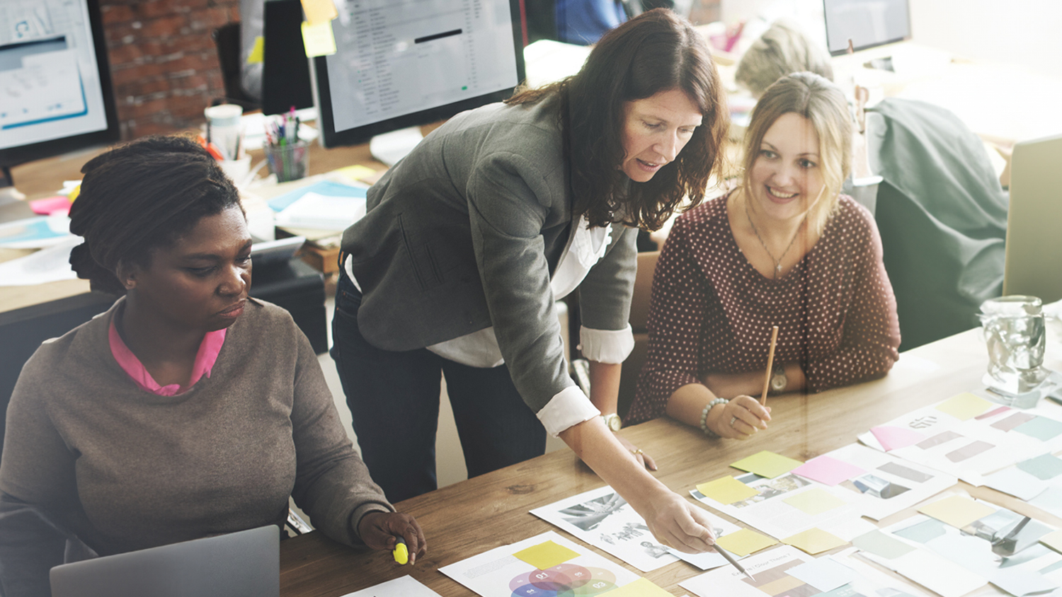 group business professionals reviewing metrics