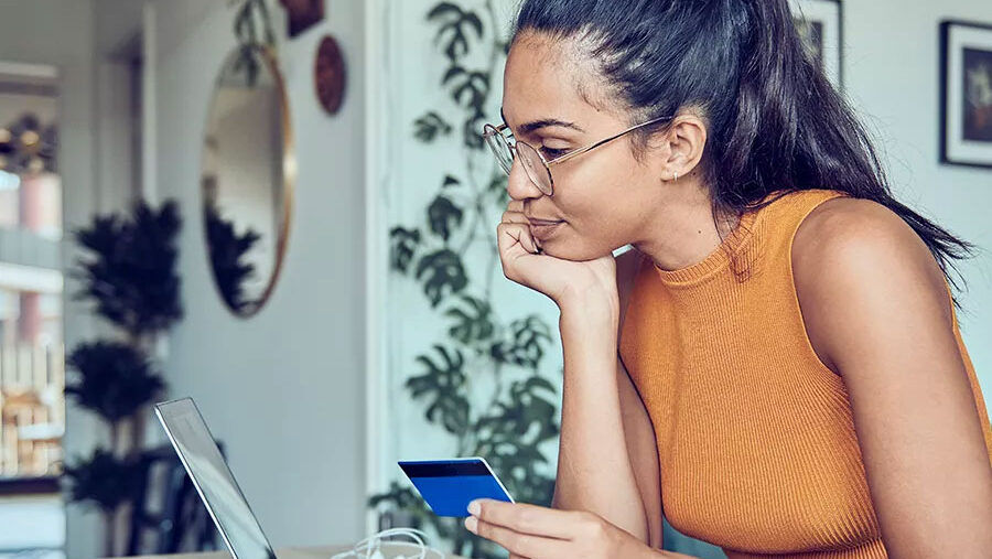 woman looking at laptop