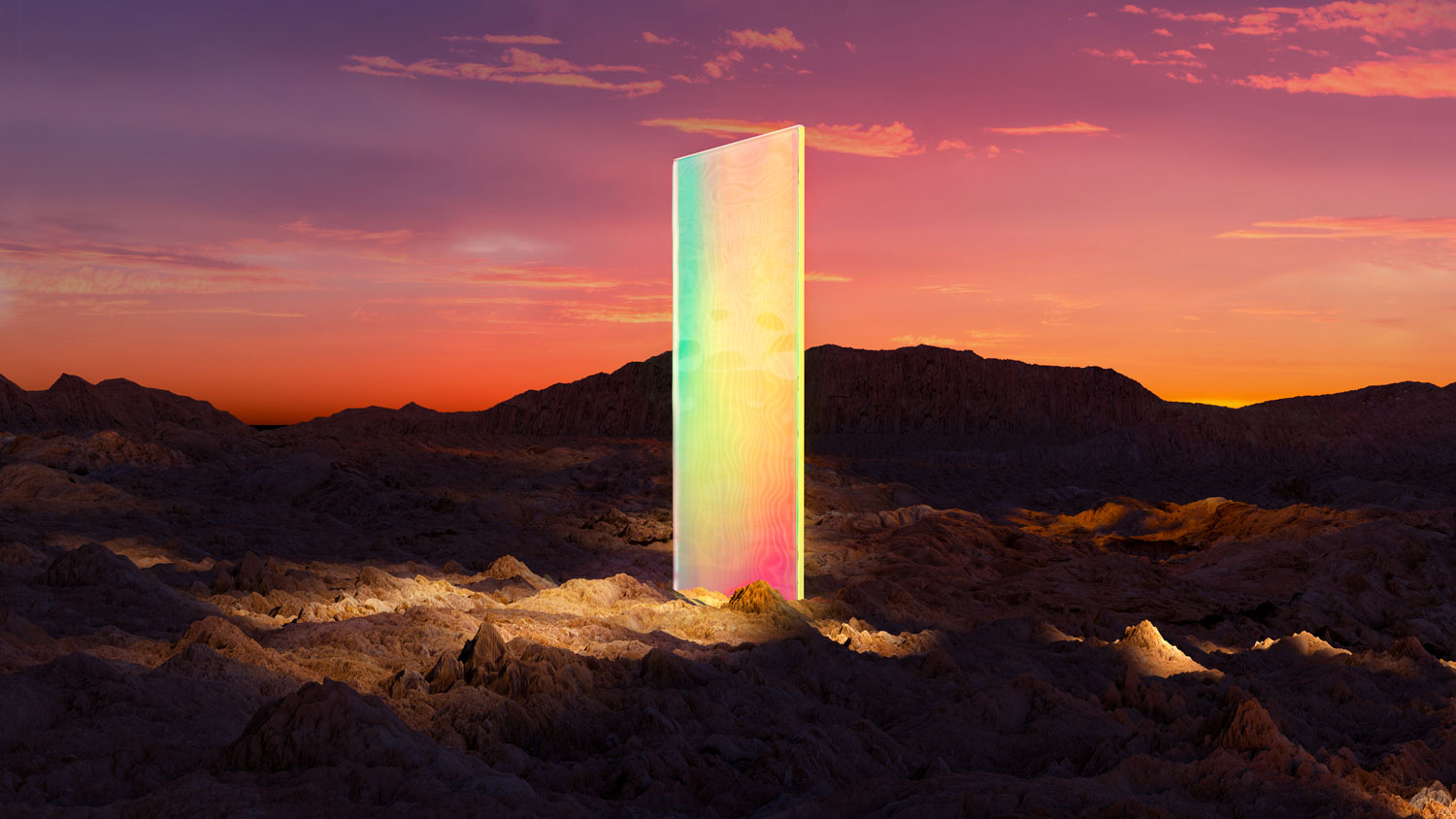 Digital generated image of multicolored portal gate in the middle of dessert on sunset sky - Metaverse concept