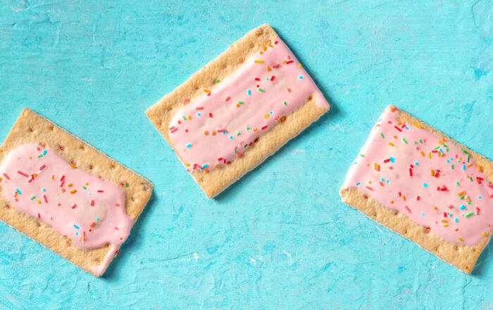 Pop tarts flat lay panorama on a blue background