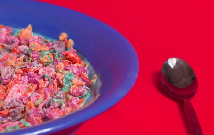 cereal in blue bowl with spoon