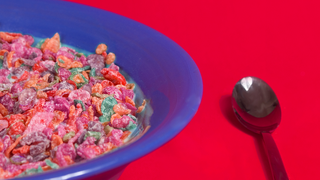 cereal in blue bowl with spoon