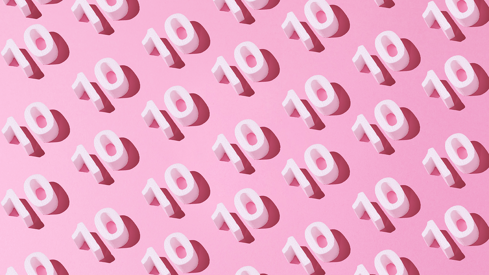 Repeating pattern of the number 10 on a pink background