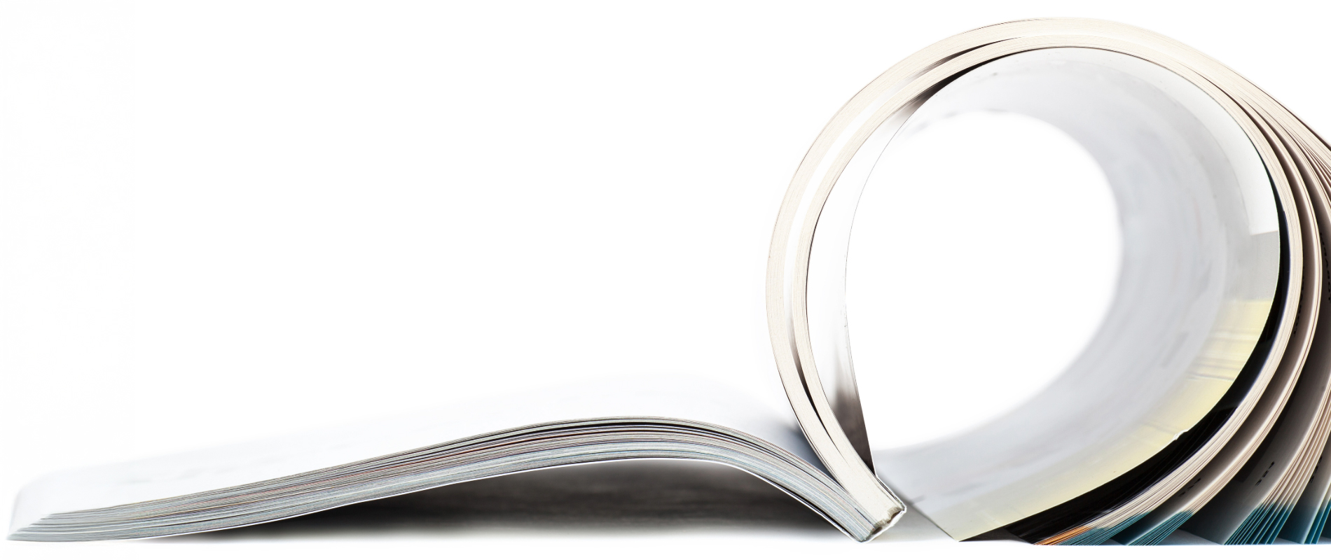 Side view of a magazine partially rolled up