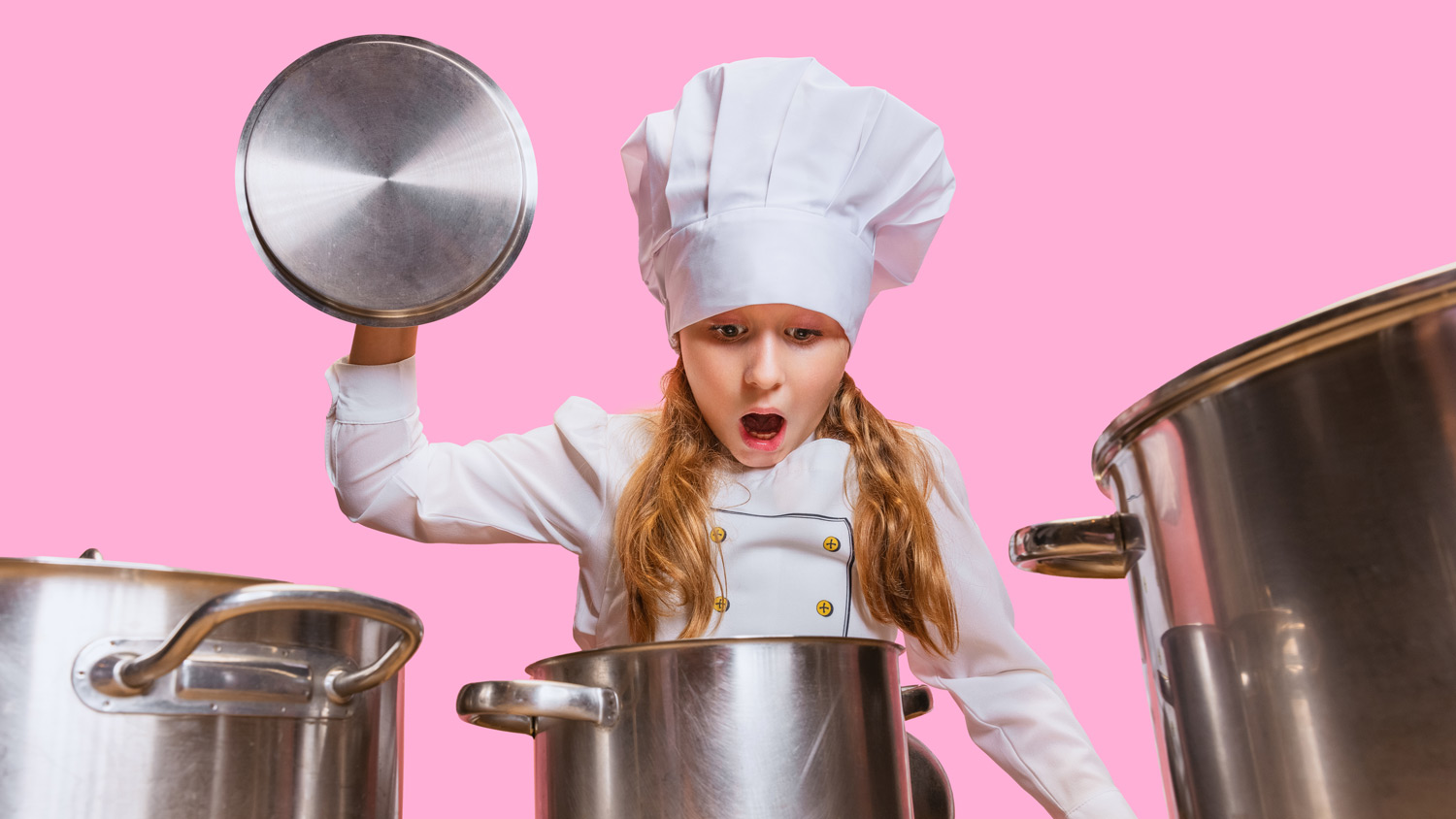 A young chef surprised by what is inside the pot they opened.