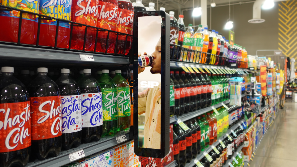 In-store retail media network display showcases CPG products at point of purchase An in-store retail media network display showcases CPG products at the point of purchase