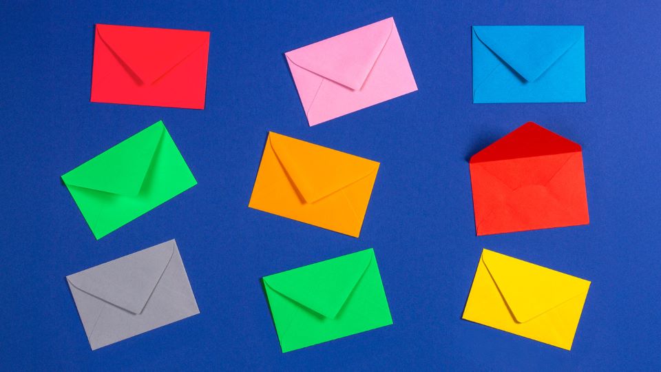 Colorful envelopes on a blue background
