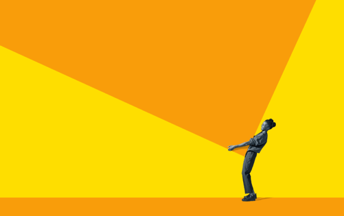 Person holding up a giant orange rectangle