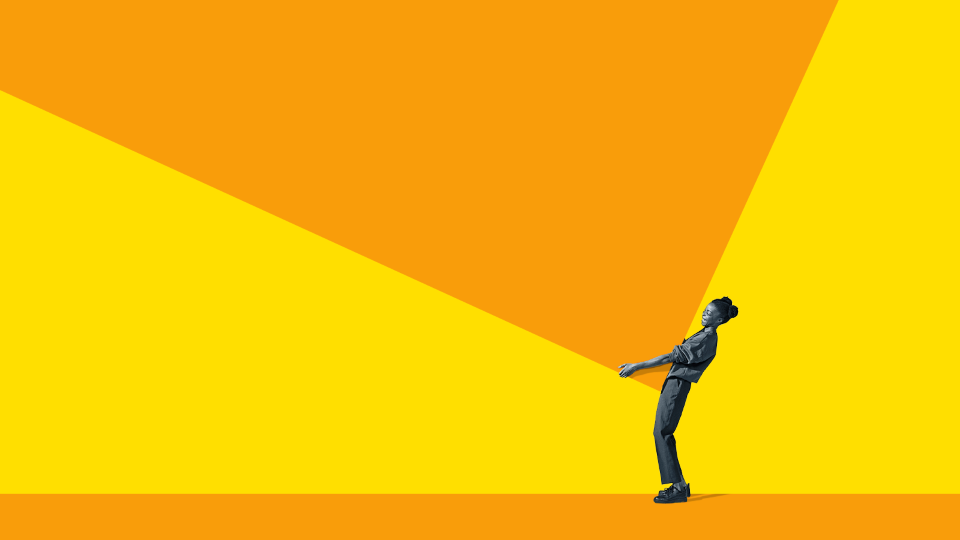 Person holding up a giant orange rectangle