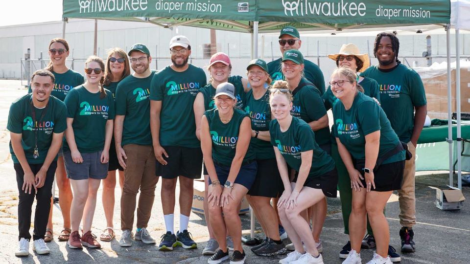Group of employees participating at the Milwaukee Diaper Mission.