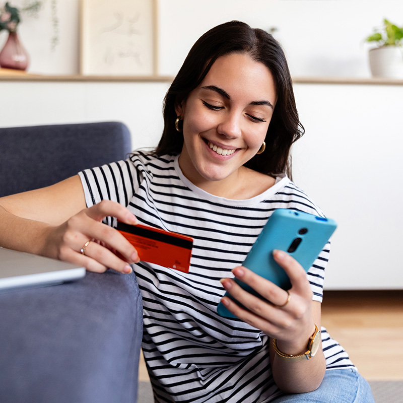 A consumer making an online order via her mobile device A consumer making an online order via her mobile device