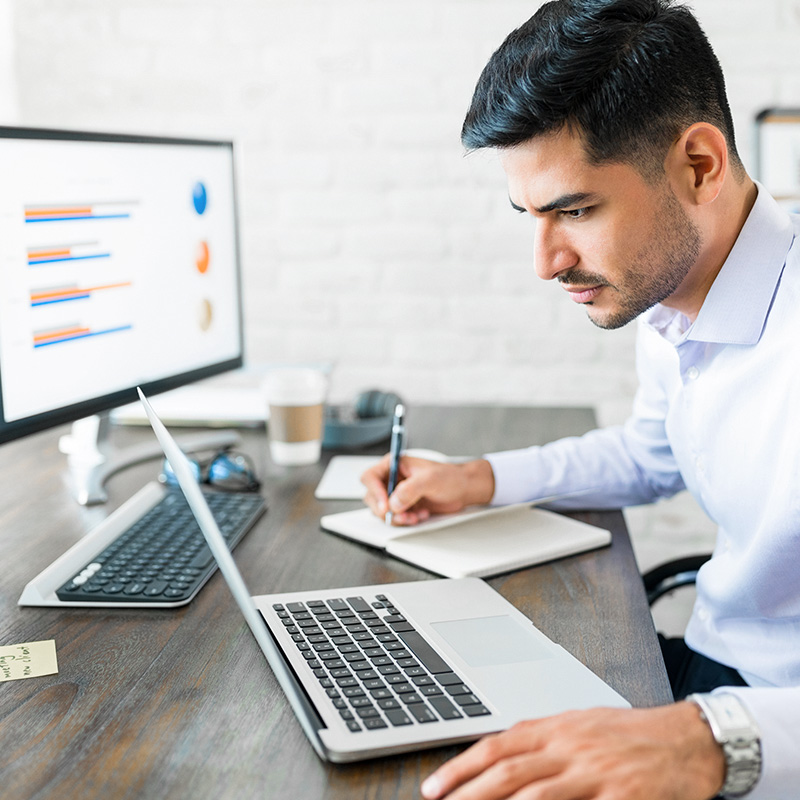 A data specialist analyzing paid media reports for a client