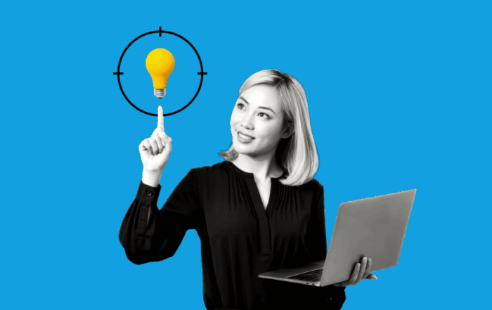 A woman holding their laptop in their left hand, while pointing up at a yellow lightbulb in front of a blue background