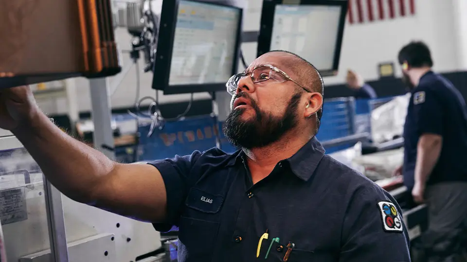 A Quad print manufacturing employee A Quad print manufacturing employee